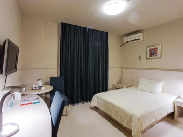 จินเจียงอินซิลิยวนอีโคโนมิคเดฟเวลลอฟเม้นโซนโฮเต็ล Hotel อู๋ซี ภายนอก รูปภาพ