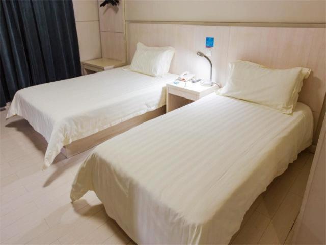 จินเจียงอินซิลิยวนอีโคโนมิคเดฟเวลลอฟเม้นโซนโฮเต็ล Hotel อู๋ซี ภายนอก รูปภาพ
