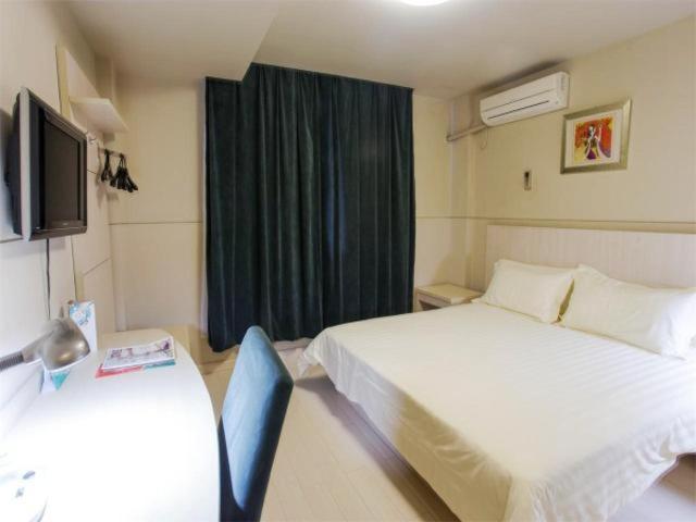 จินเจียงอินซิลิยวนอีโคโนมิคเดฟเวลลอฟเม้นโซนโฮเต็ล Hotel อู๋ซี ภายนอก รูปภาพ